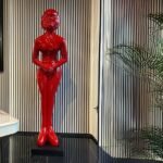RED WOMAN STATUE