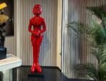 RED WOMAN STATUE